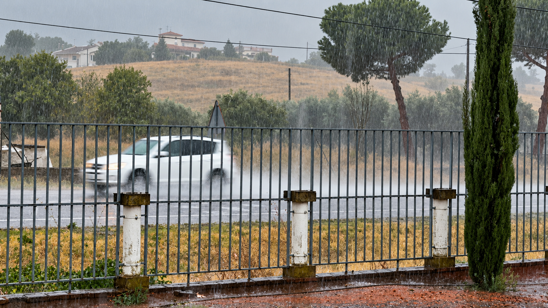 FOTO LLUVIA COCHE EN CARRETERA